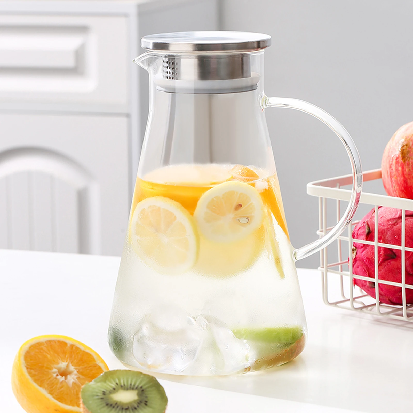 Real product scene showing a pitcher with its lid and filter direction
